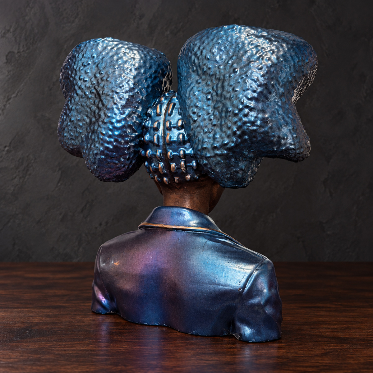 Star Afro Head Planter, rear hair and jacket.