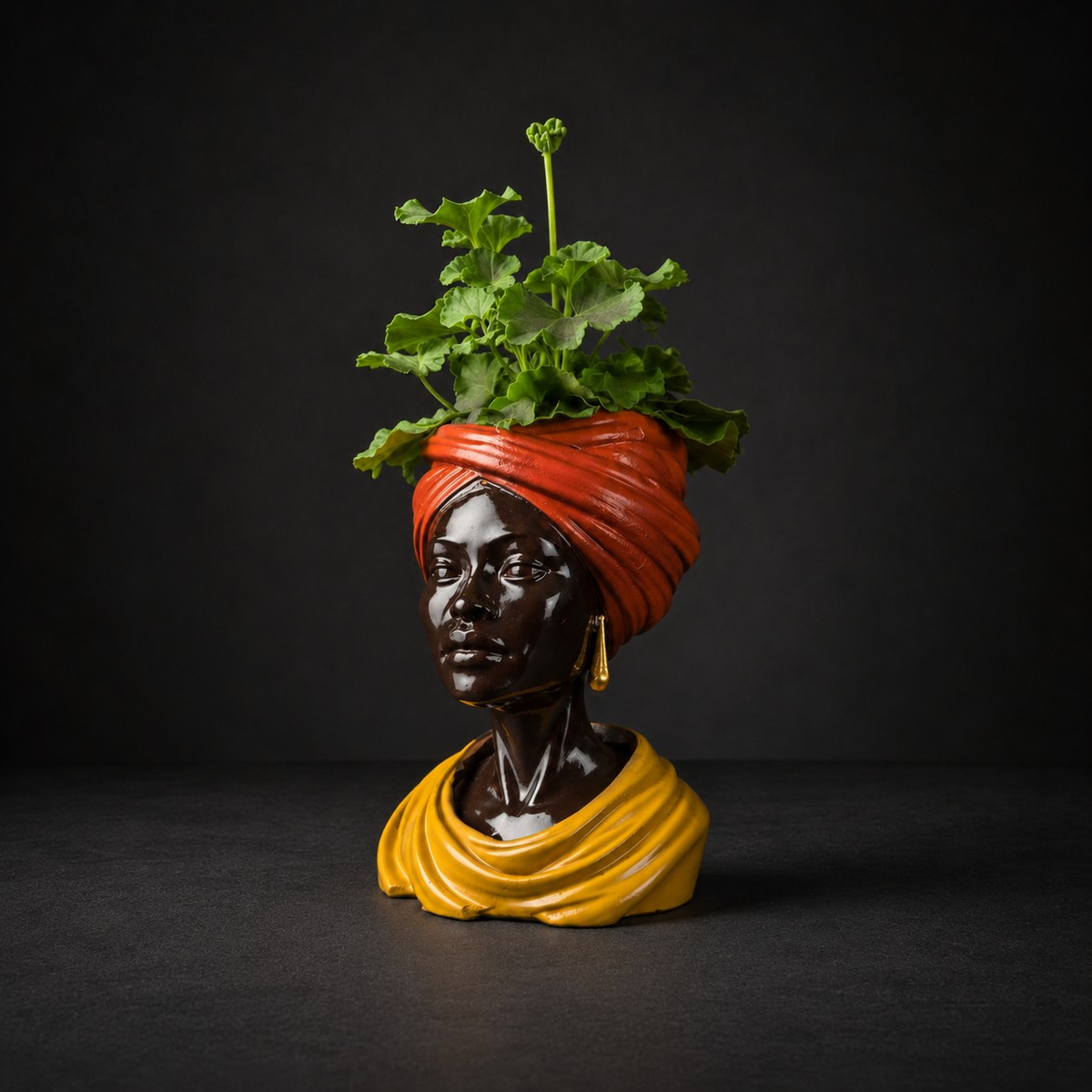 Golden Hour head planter with green plant at three quarter angle