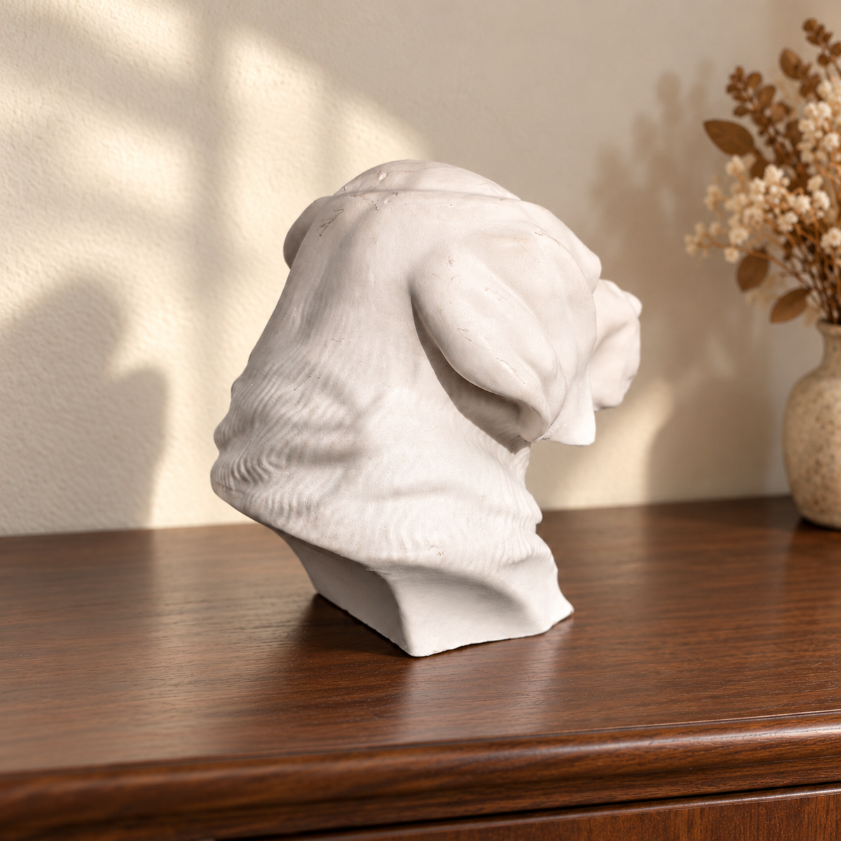 Rear of the Labrador head urn showing ears, fur and flat cut base