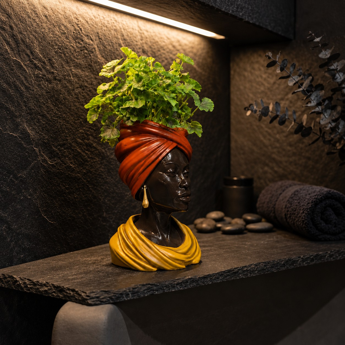 Golden Hour planter styled on dark shelf with plant