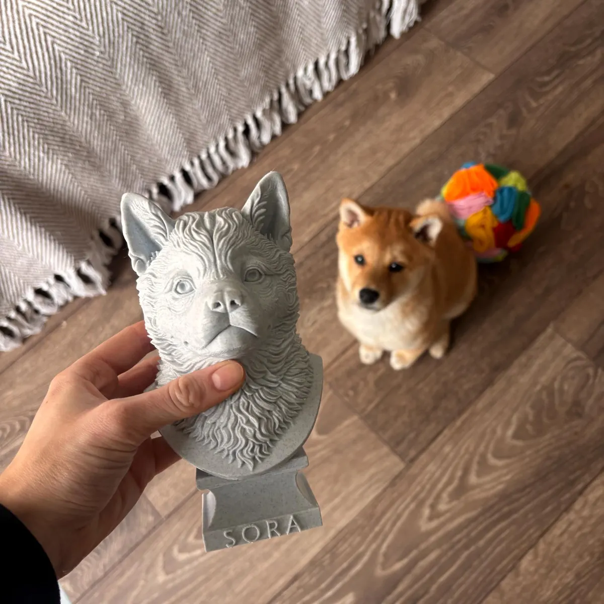 Custom Pet Bust from Photo | Personalised Pet Memorial: Warm Marble Grey custom dog bust held beside pet photo