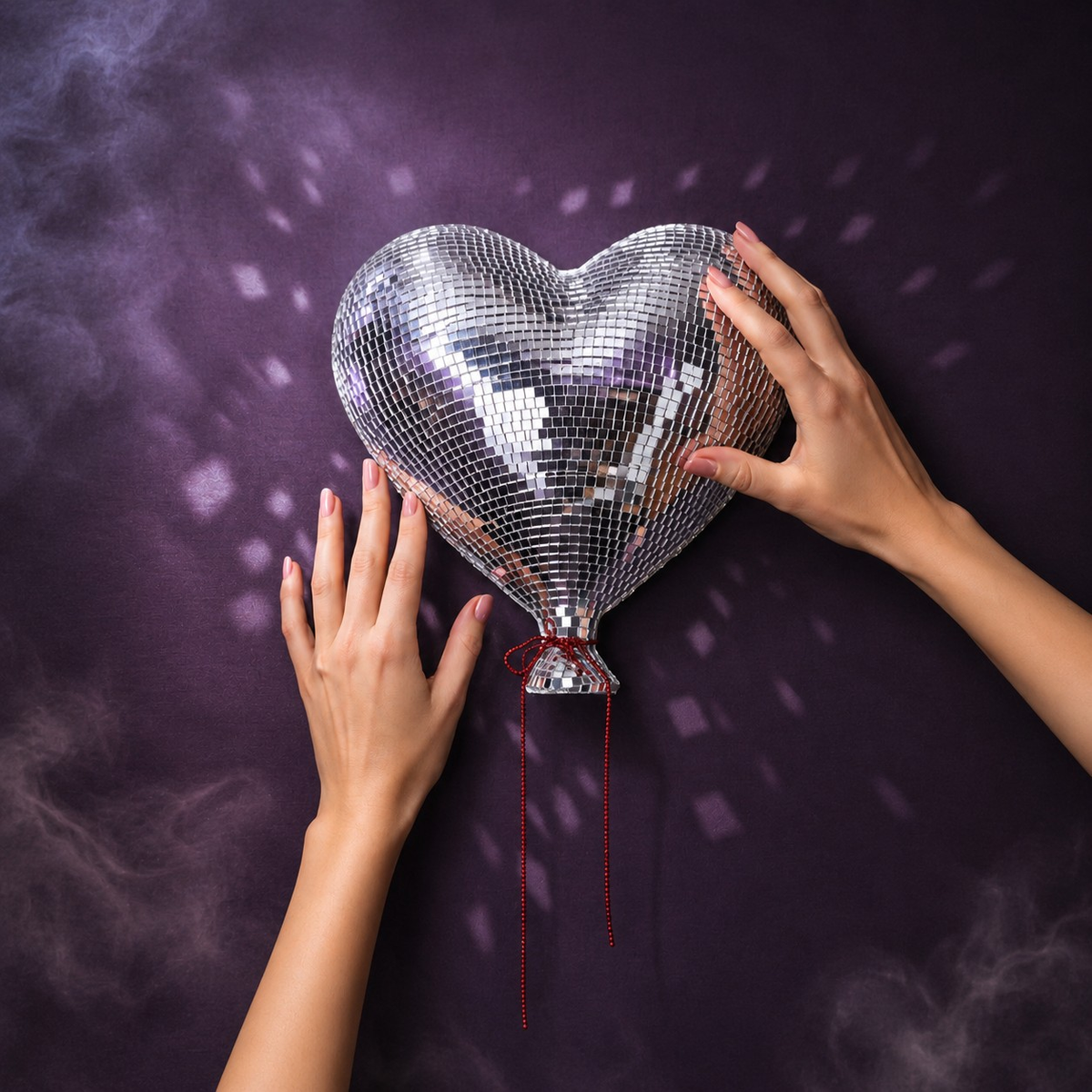 Heartthrob mirror ball heart wall art hands scale image