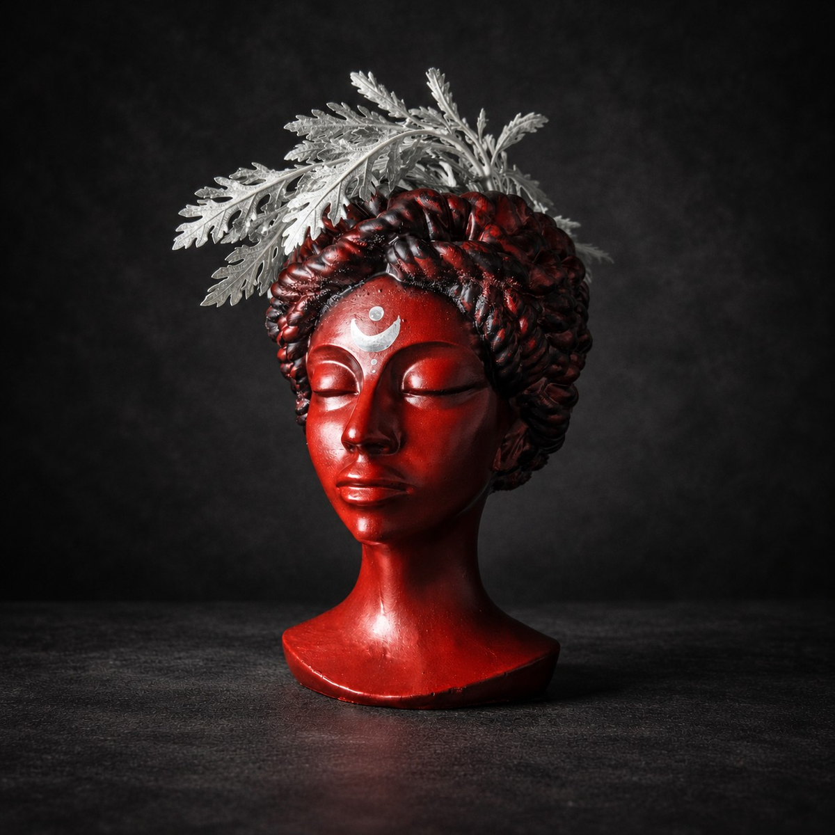 Goddess Bust Planter: pale fern foliage rises above the bust