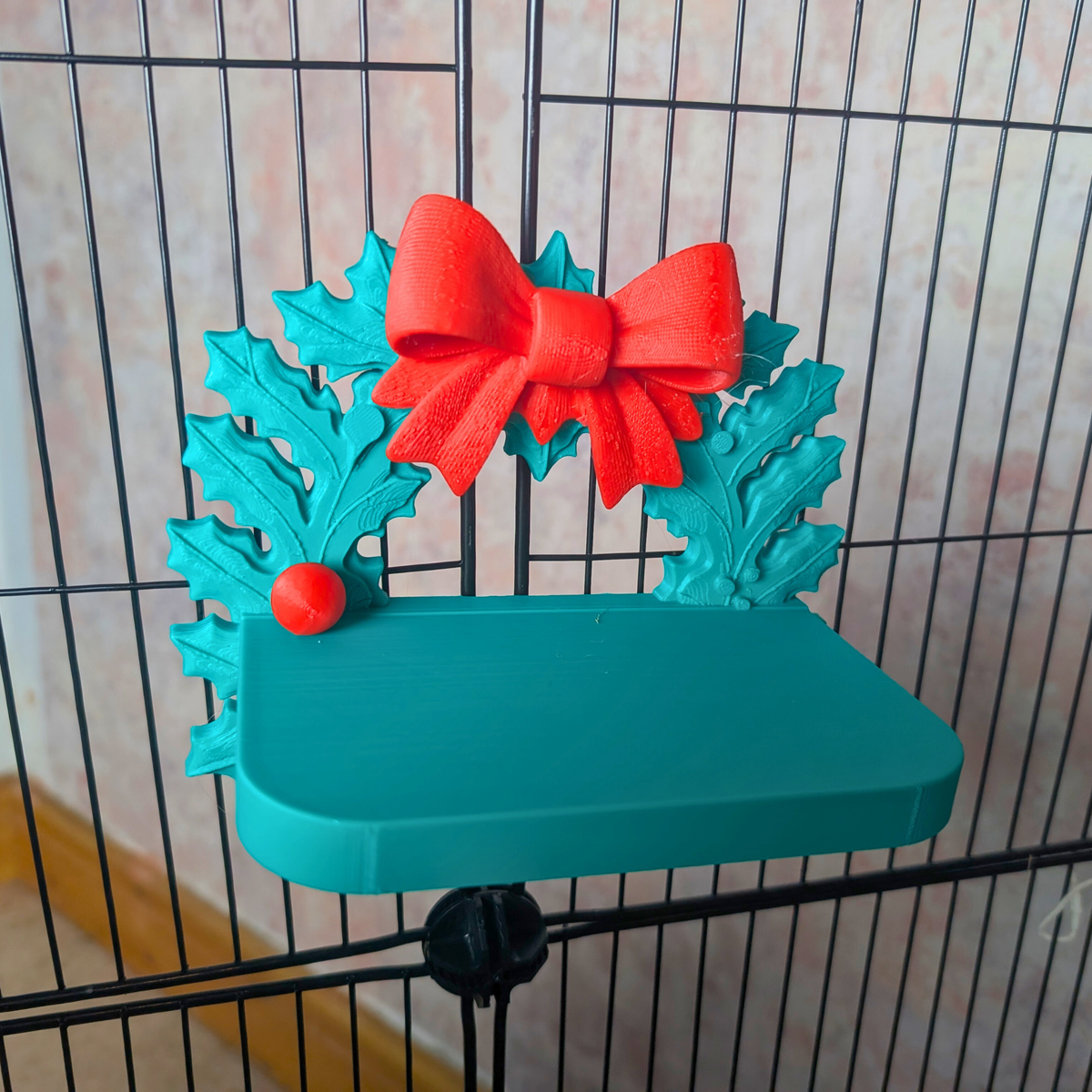 Empty turquoise Christmas wreath rat shelf, front view