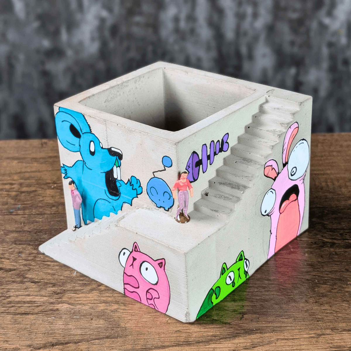 Top three-quarter view of empty graffiti building planter and stair detail