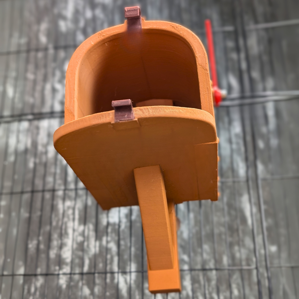 Personalised Rat Mailbox Hide: underside and supporting wall bracket