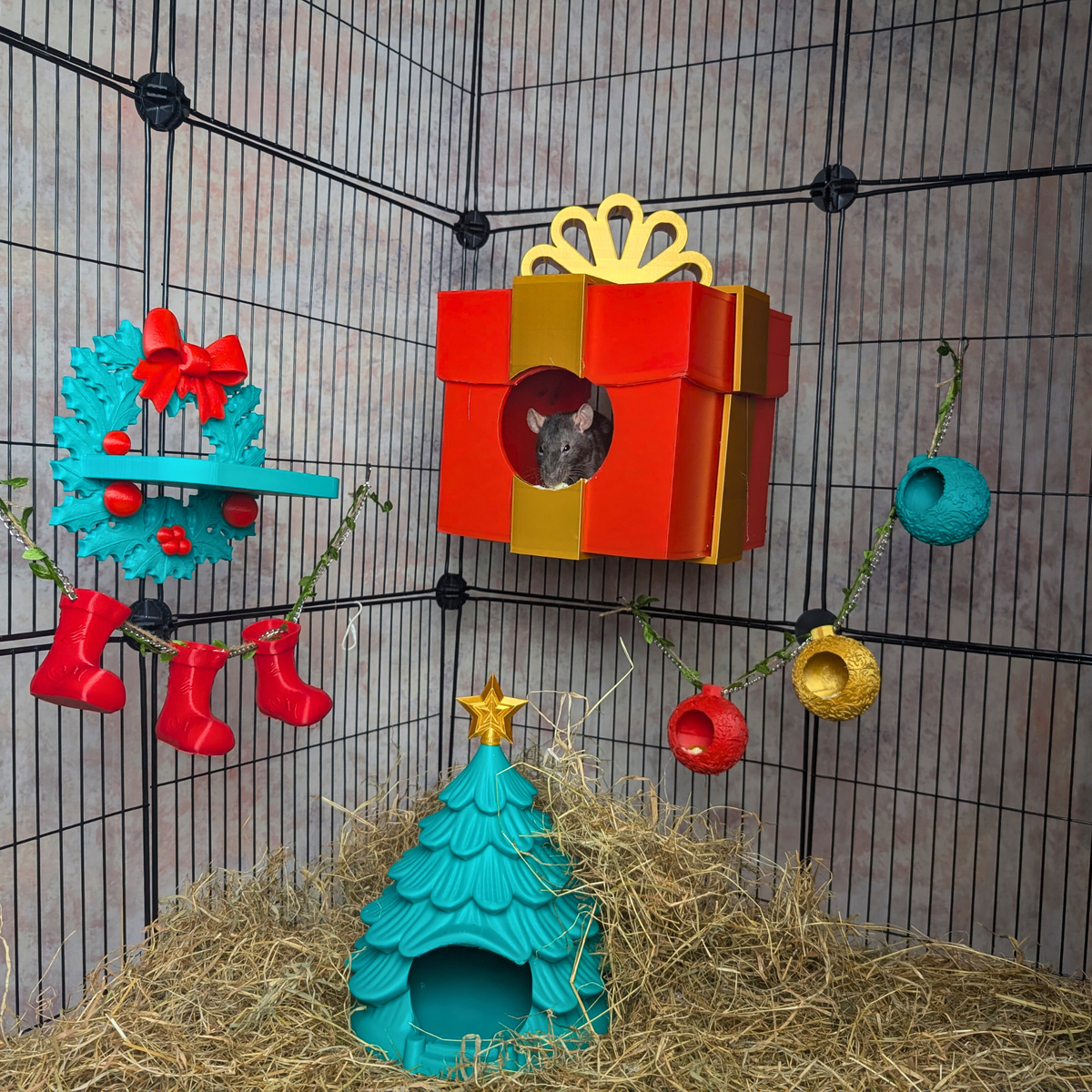 Complete Christmas rat cage accessories installed together