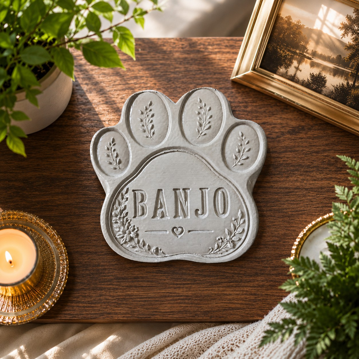 Personalised Paw Grave Marker, close view of a paw-shaped grave marker on a wooden surface