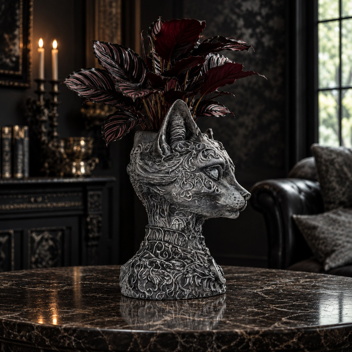 Side lifestyle view of cat planter with burgundy foliage