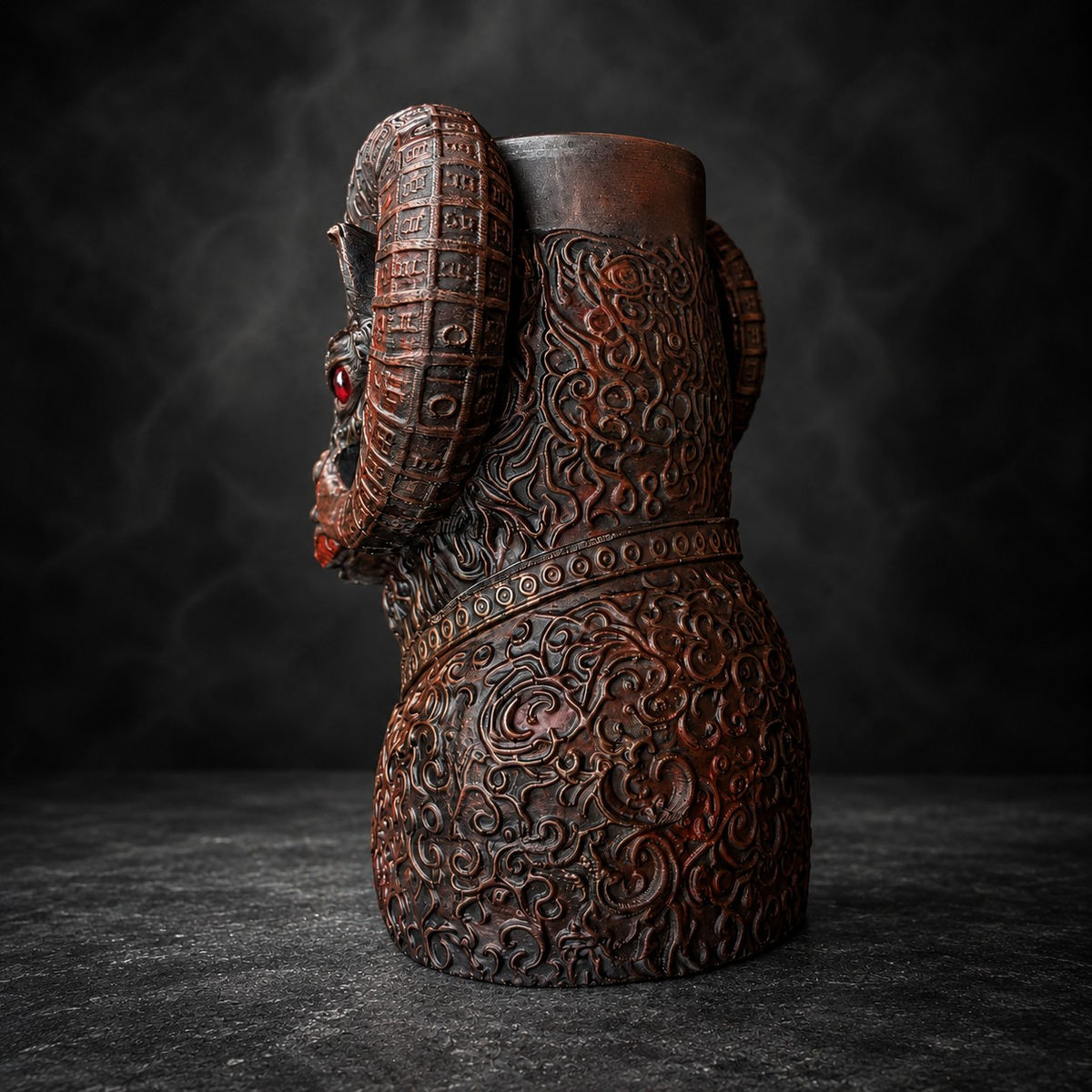 Back view of The Blood Moon Ram cast stone planter showing carved scrollwork and planting cavity