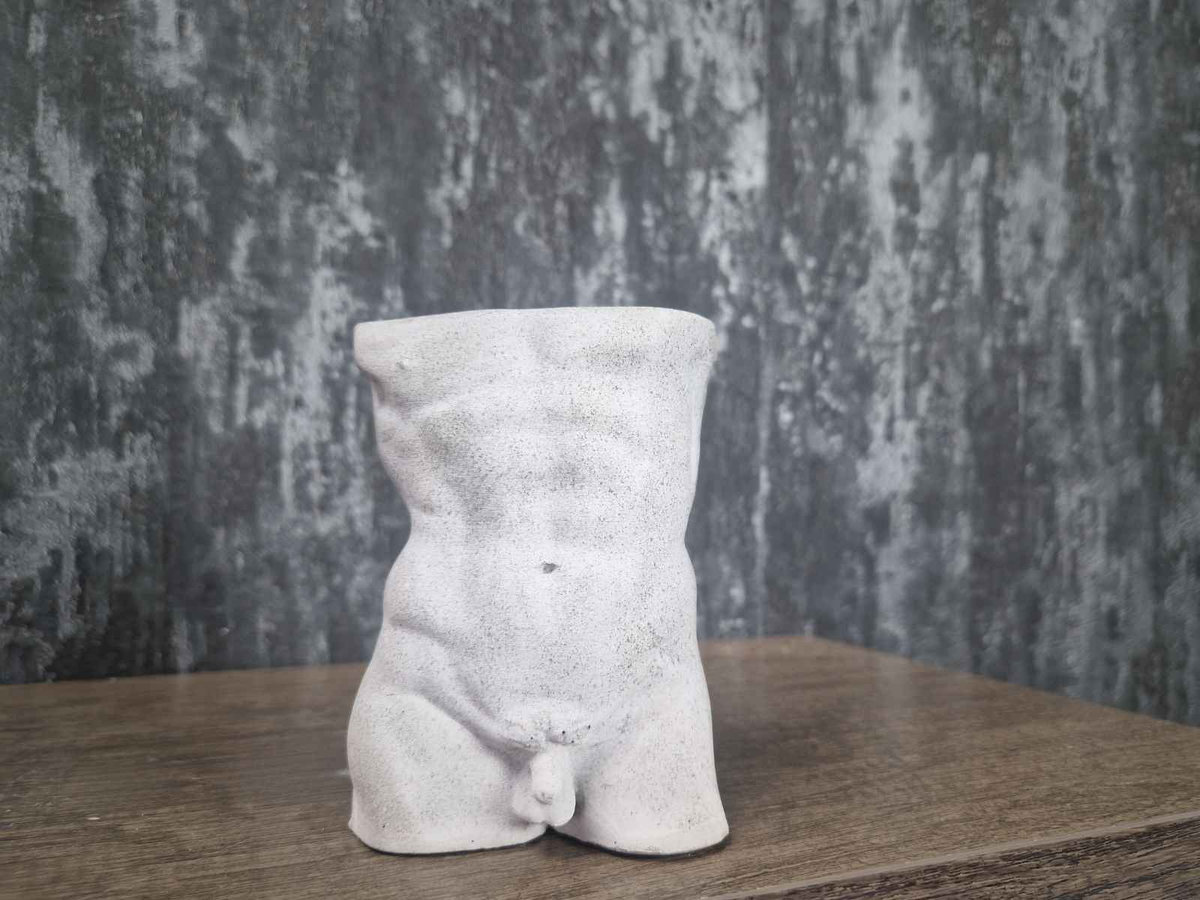 Unplanted Greek god male torso planter shown front-on