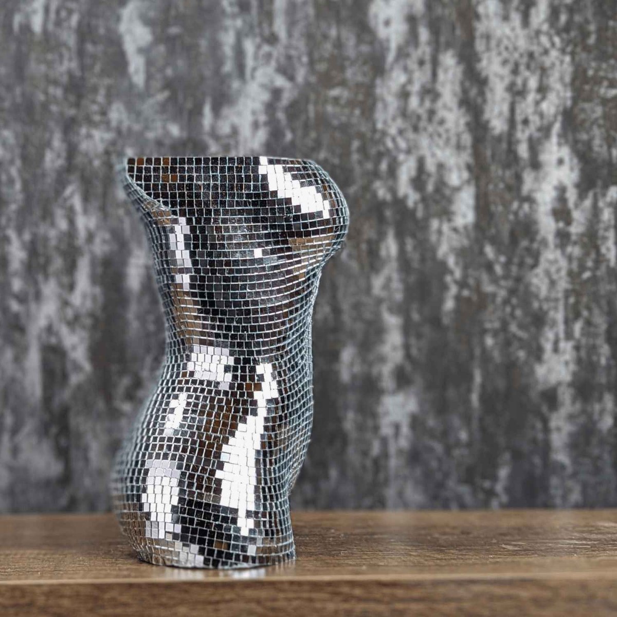 Unplanted silver mirror torso planter, side profile