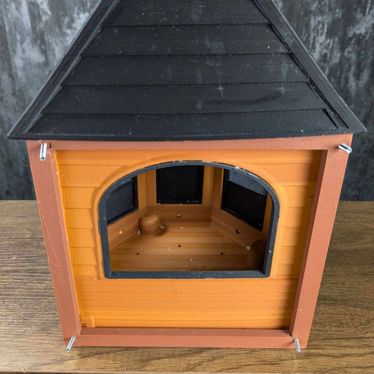 Open rear of orange Rat Mansion hide showing the interior floor