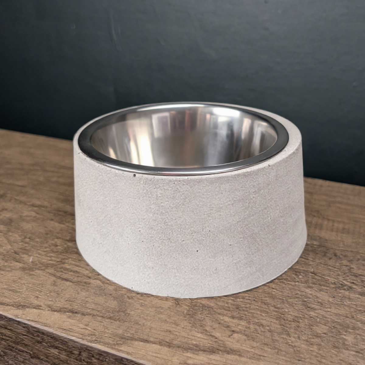 Cast stone pet bowl front view showing the removable steel insert