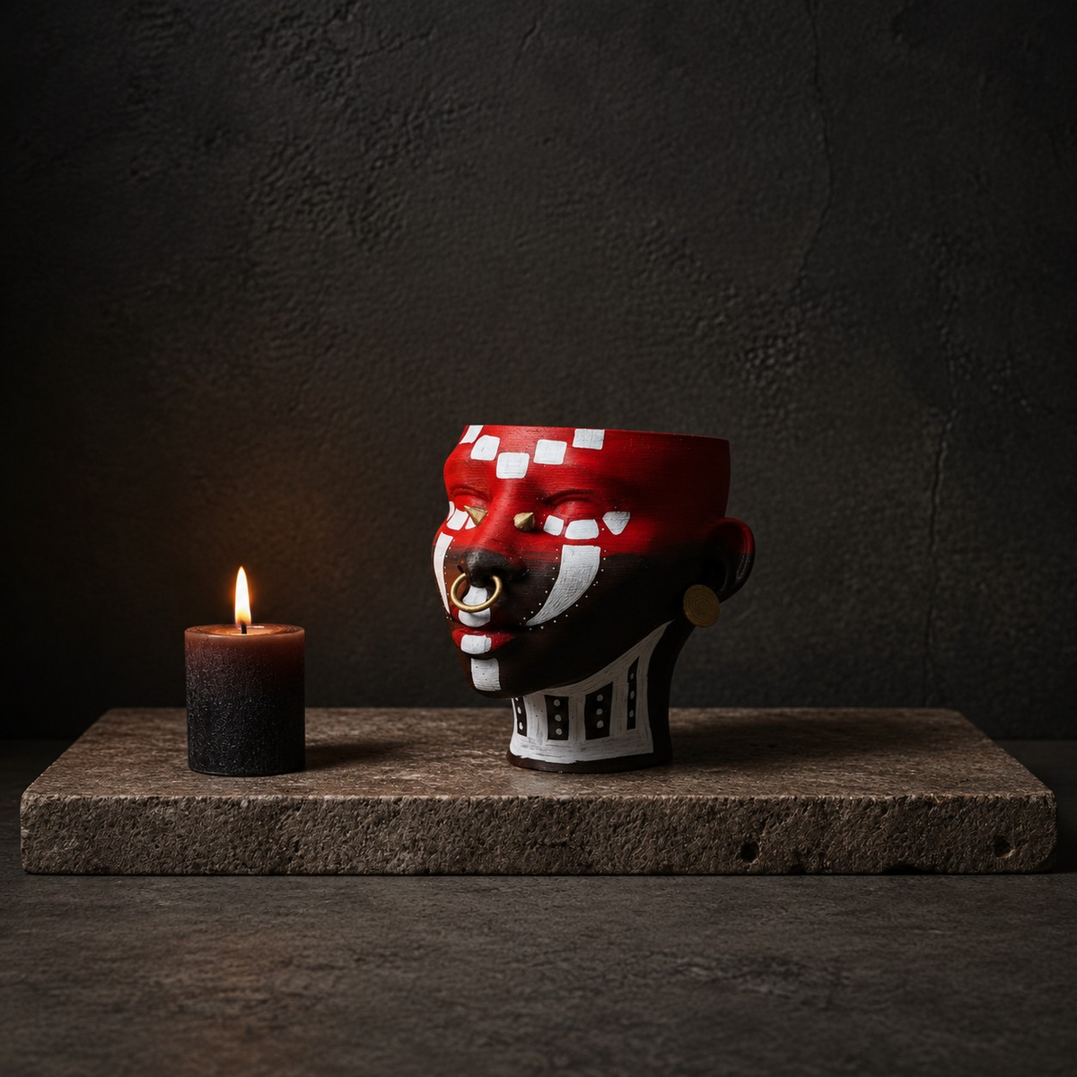 Ashanti Warrior Head Planter - Red on stone with candle