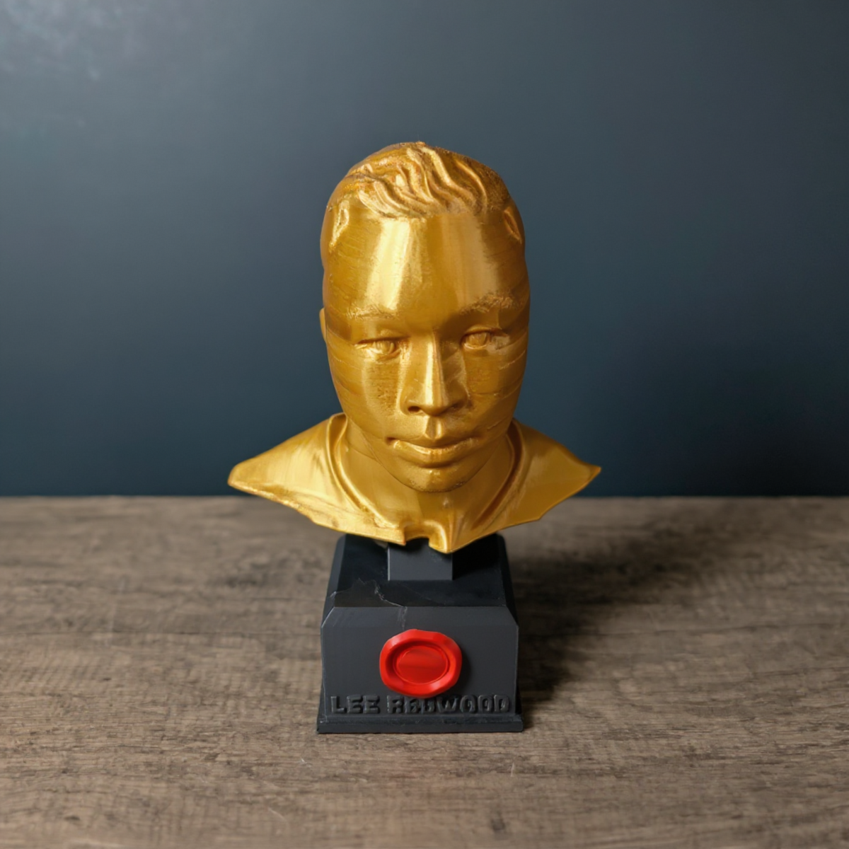 Alternative personalised gold portrait bust on a black engraved base