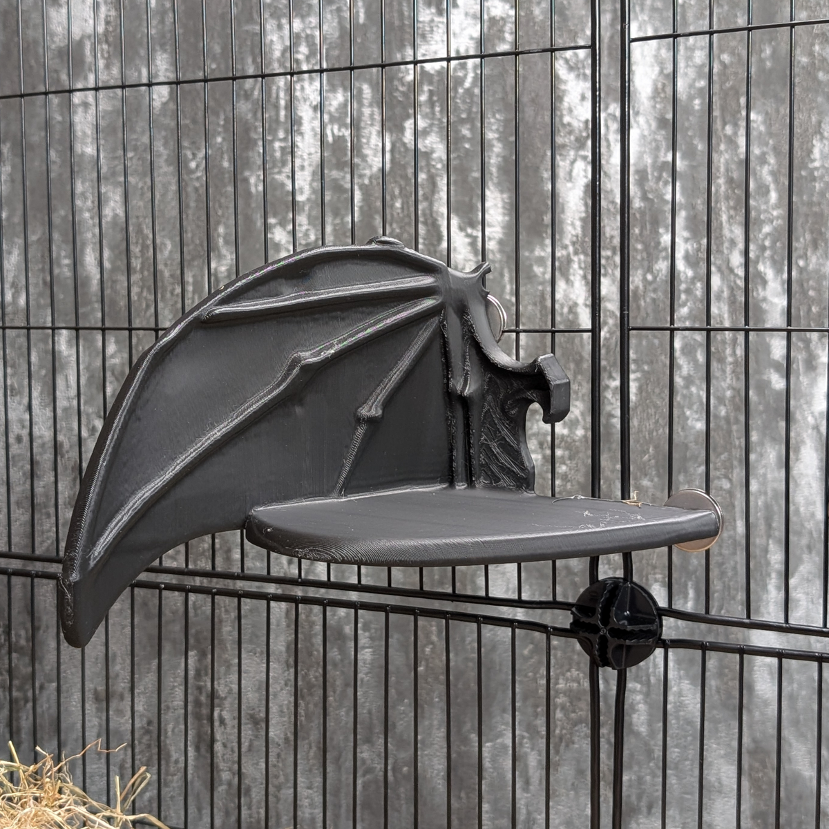 Bat Wing Rat Cage Shelf: side view of a black wing shelf mounted to the cage