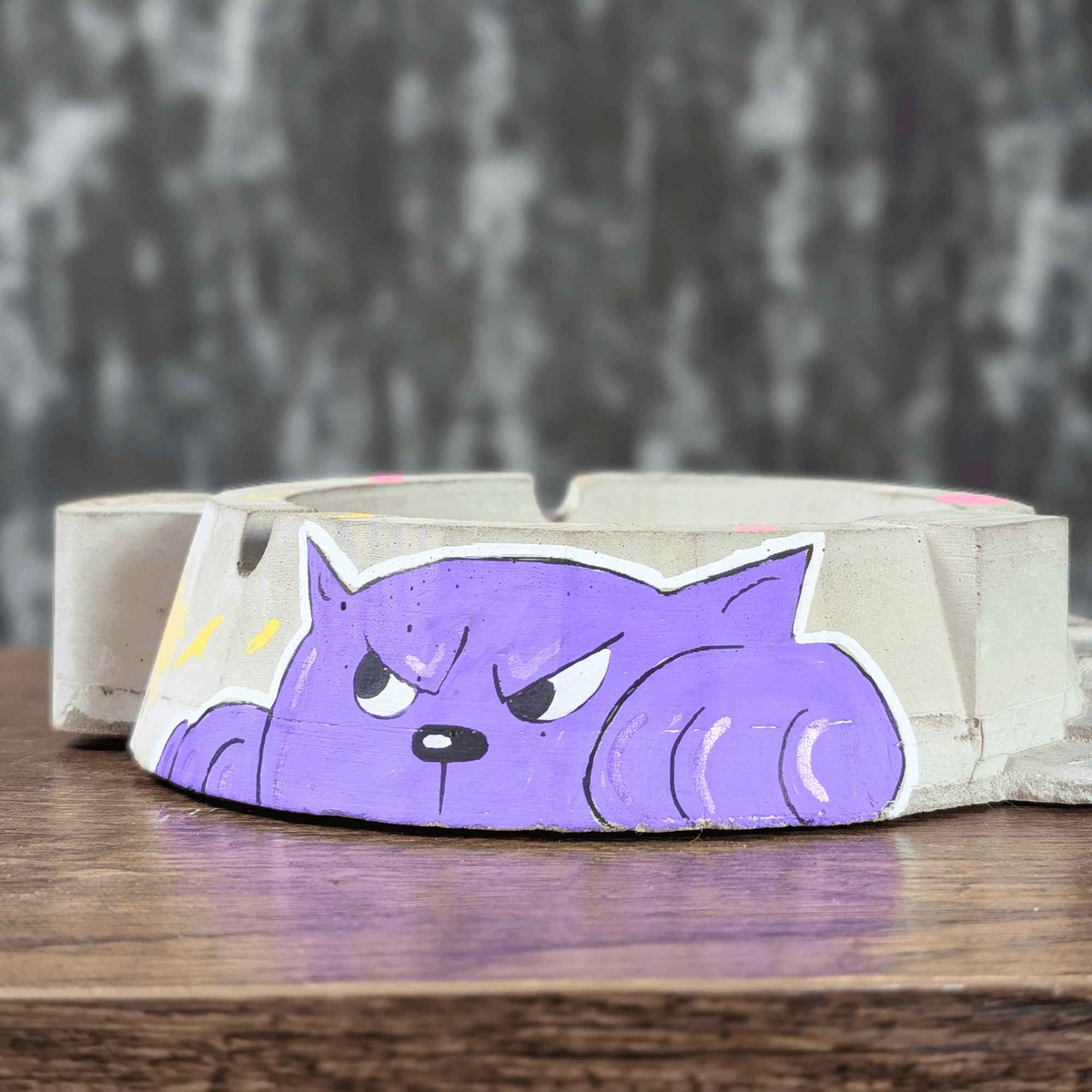 Custom graffiti ashtray side view with purple cat artwork