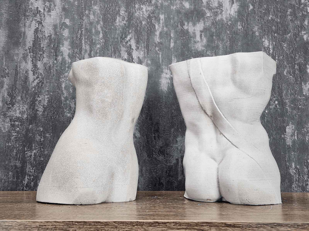 Rear views of Venus and David classical torso planters