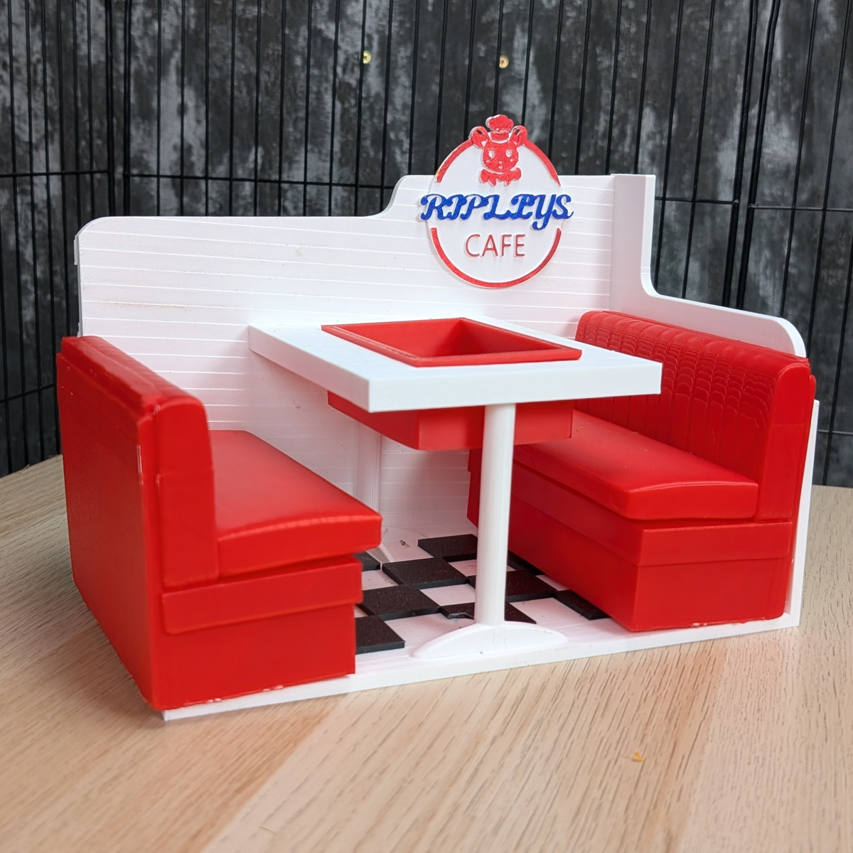Personalised Rat Diner Feeder: Three-quarter view of the diner feeder with red booths