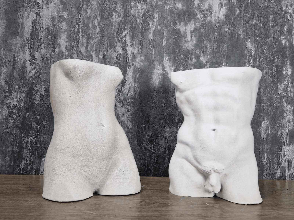 Venus and David classical torso planters shown together front-on