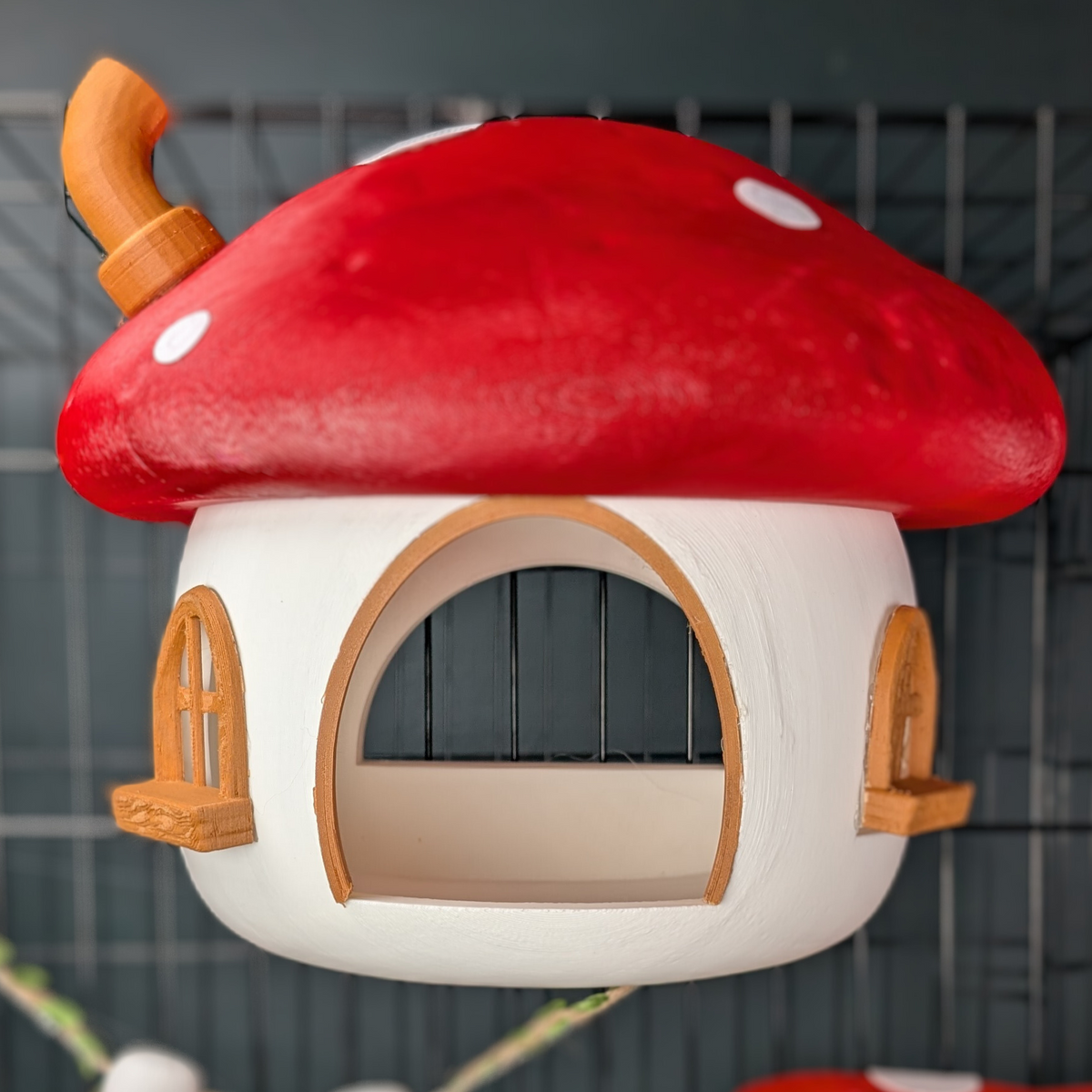 Empty red and white mushroom rat hide, front view