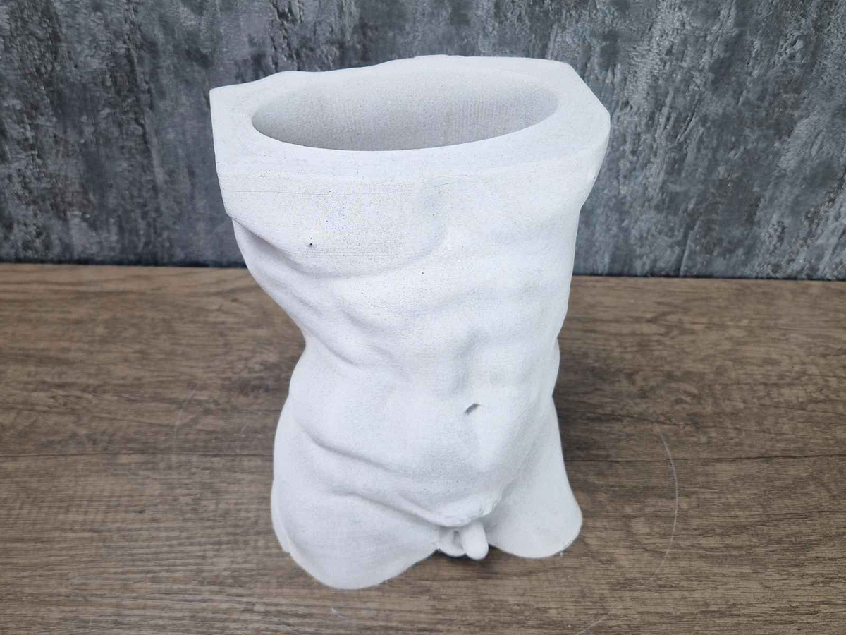 Top view of Greek god male torso planter showing the planting opening