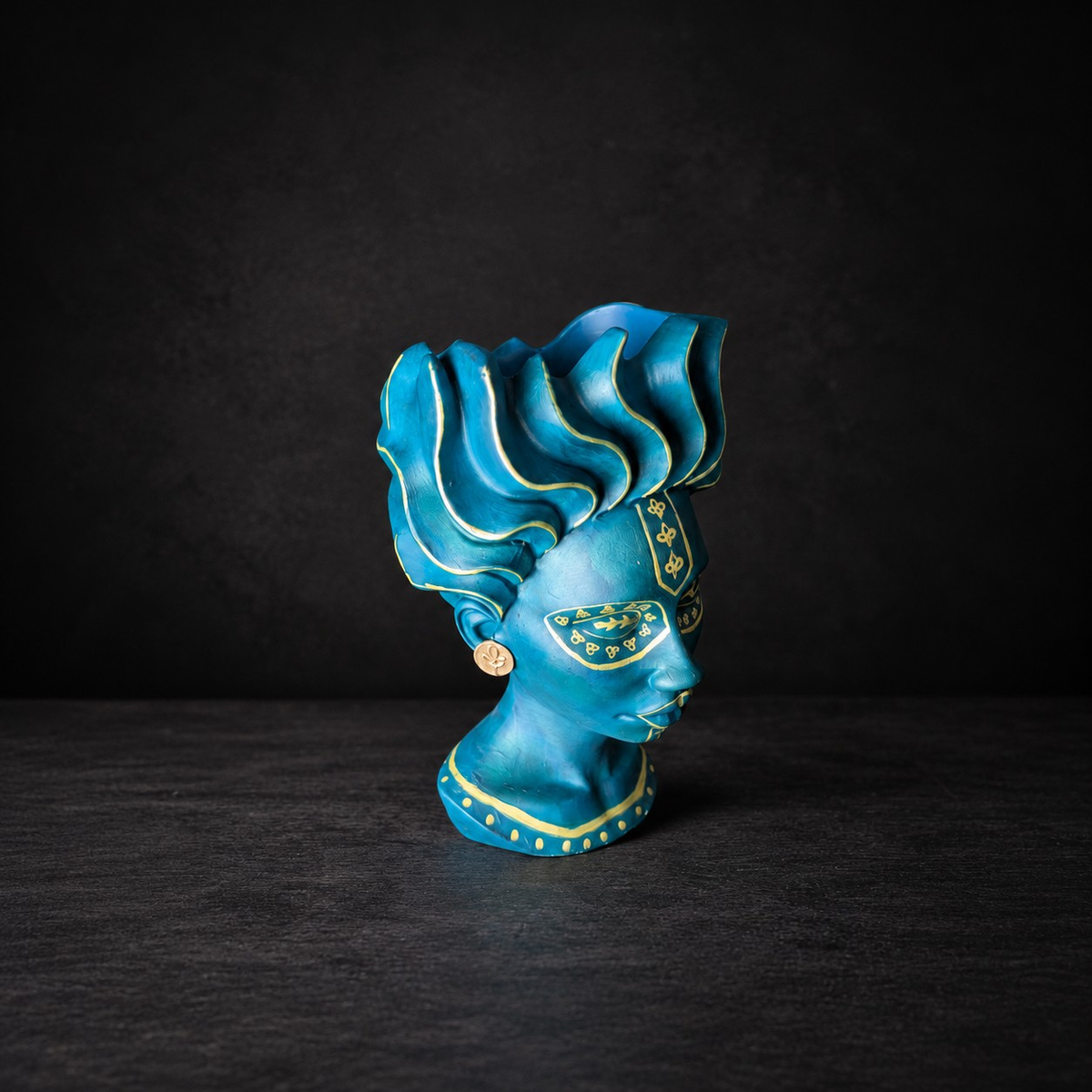 Teal African head planter with gold detail