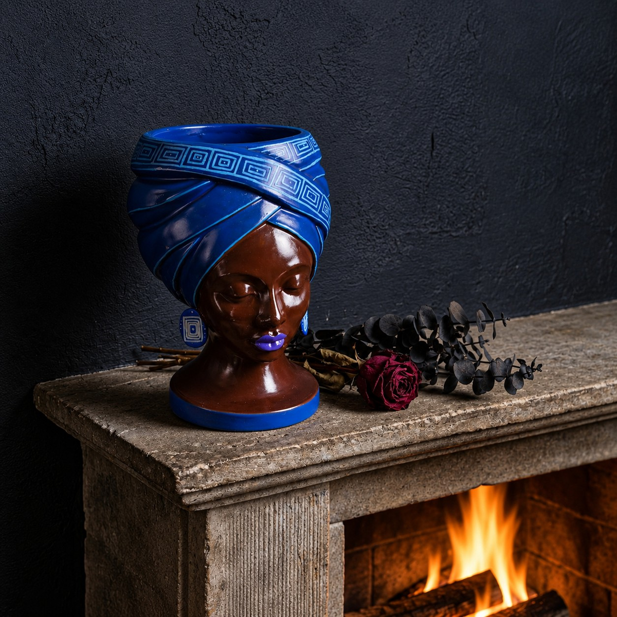 Adire Night head planter styled on a mantel