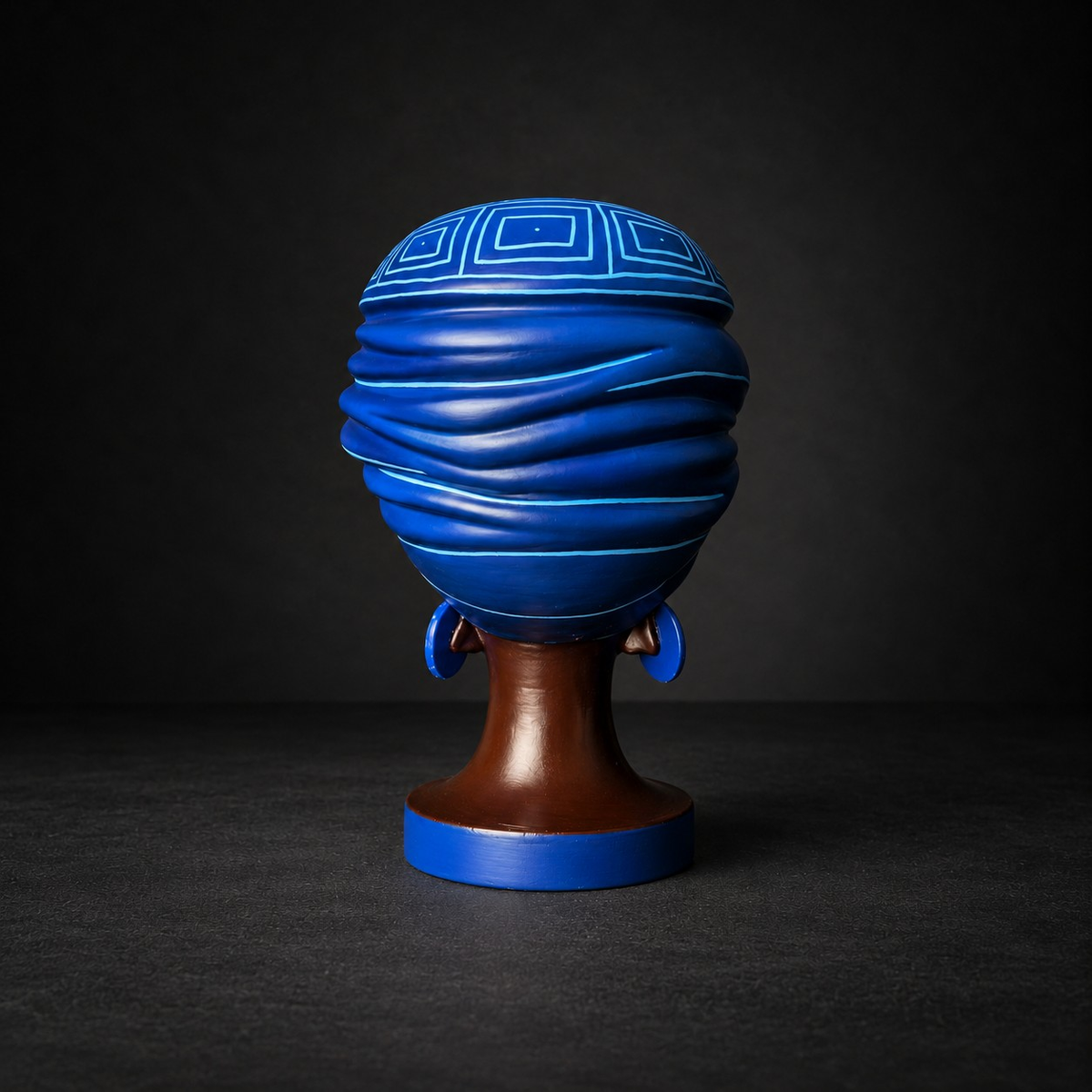 Adire Night cast stone head planter rear view