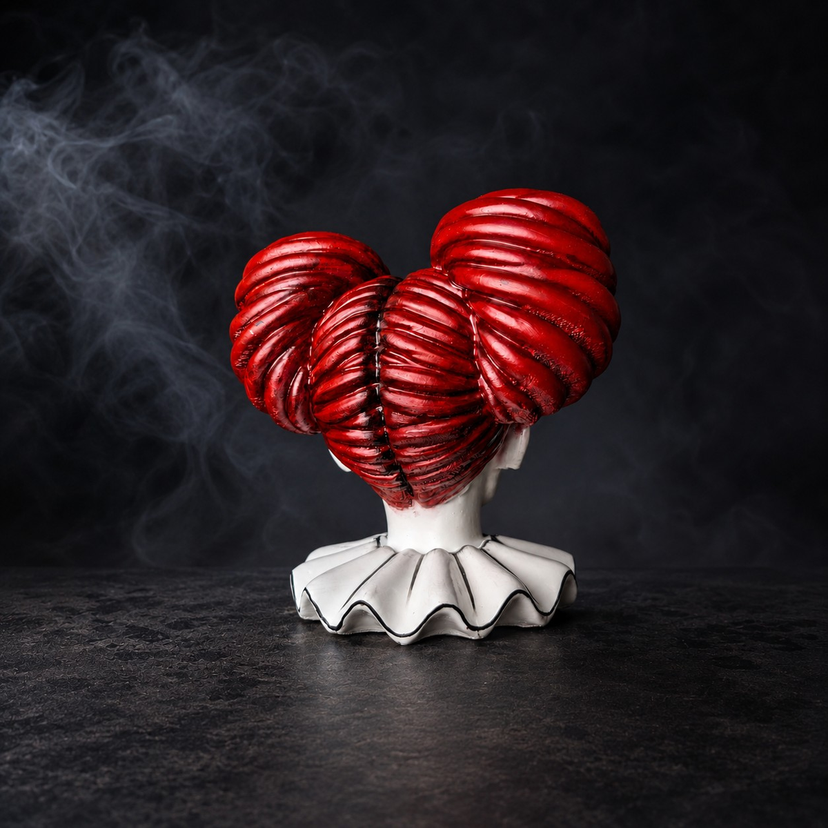 Rear view of hand-painted red hair on The Last Laugh cast stone planter