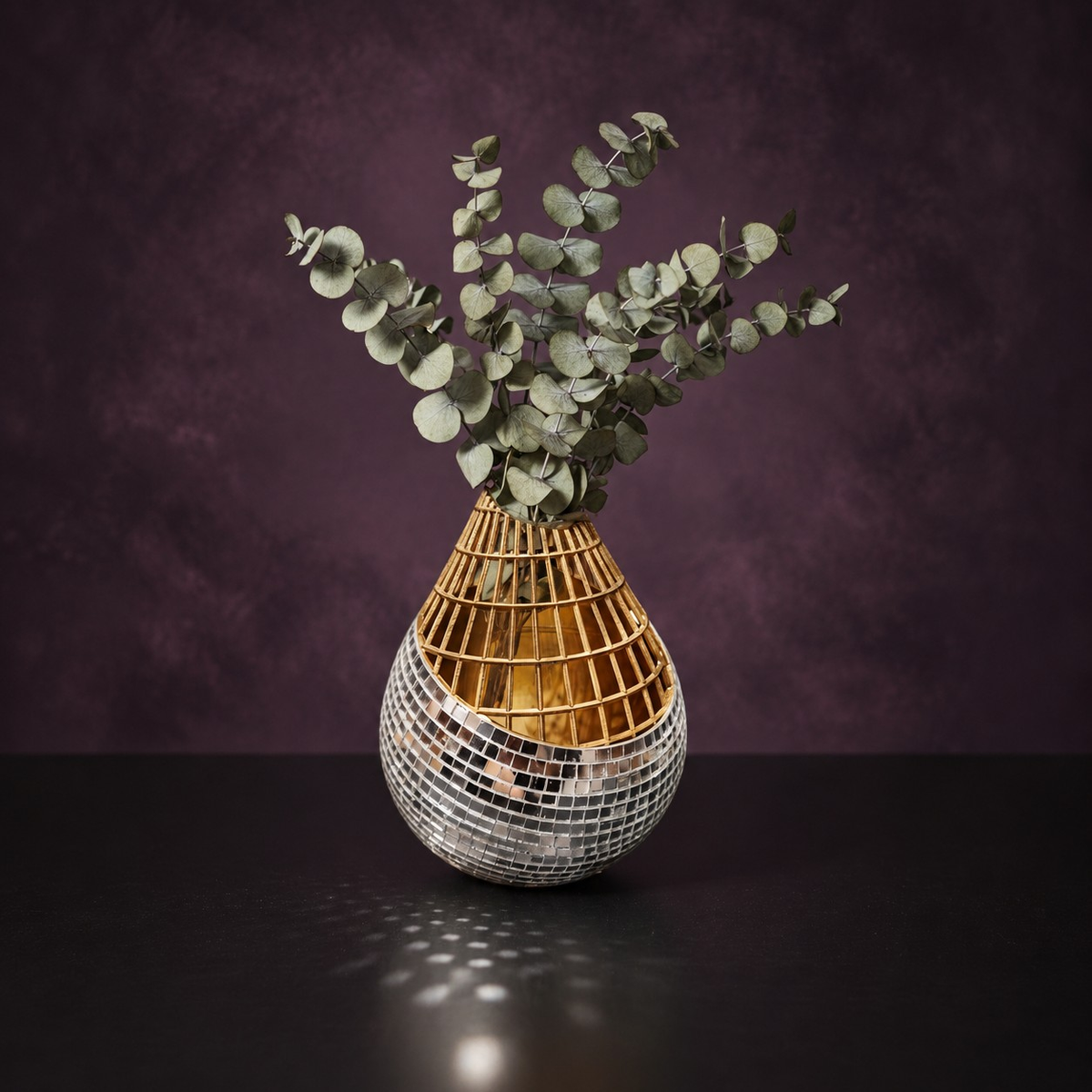 Mirror mosaic vase with dried eucalyptus