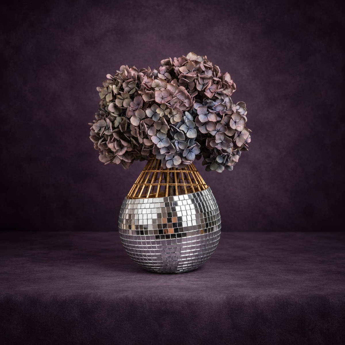 Mirror mosaic vase with dried hydrangea