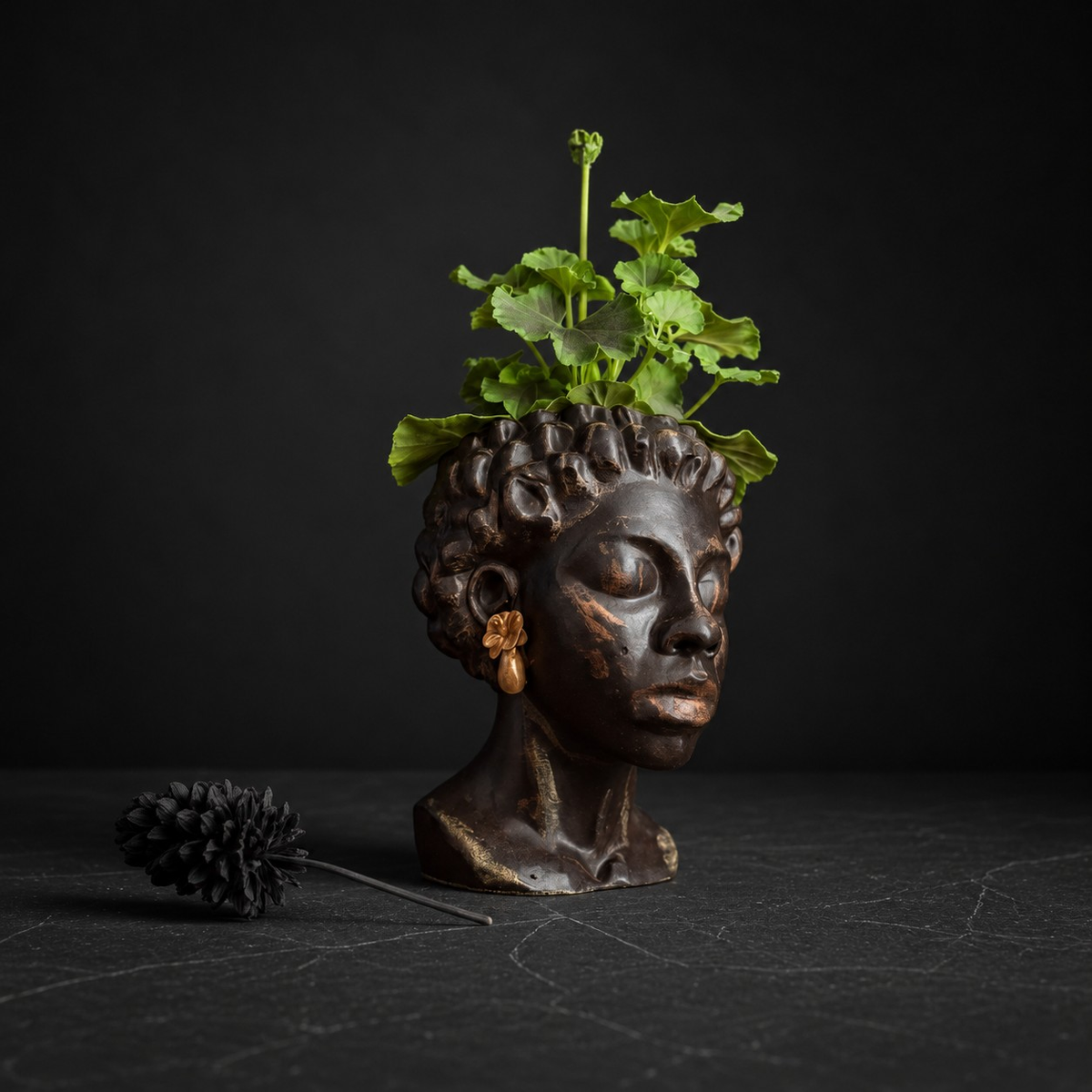 The Florid Chiaroscuro head planter in a living room setting