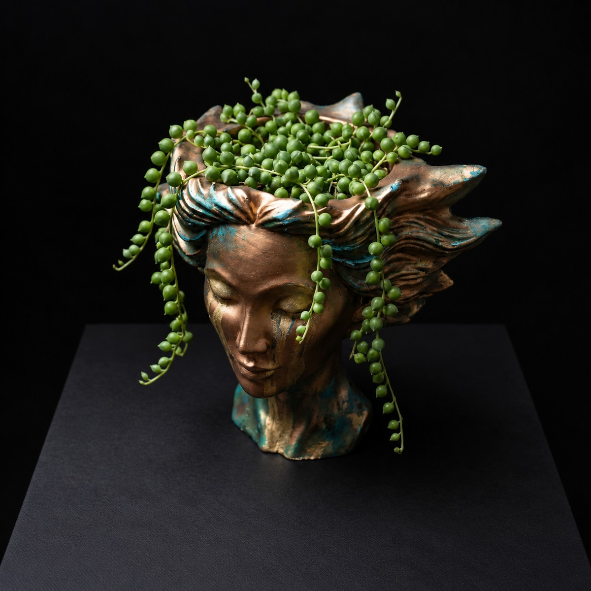Golden Tears bust planter with trailing plant