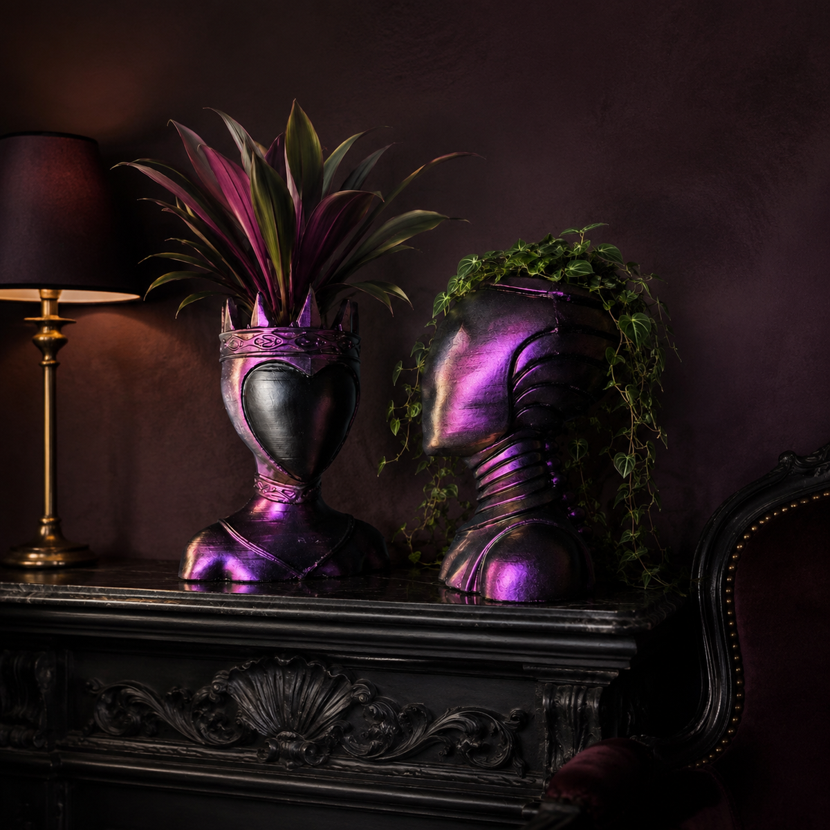 Queen and Oracle Planters, pair of purple bust planters topped with green foliage
