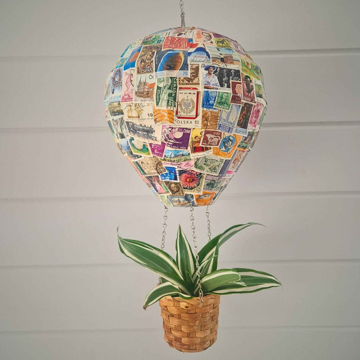 Vintage stamp hot air balloon hanging planter with basket-style plant pot
