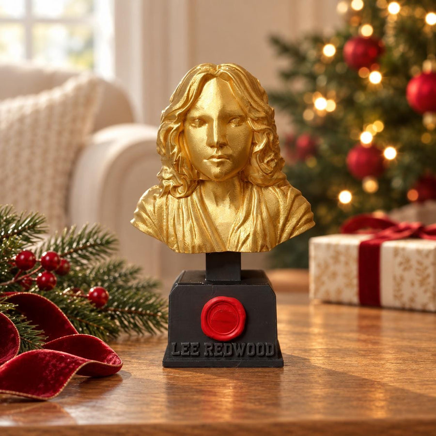 Personalised Gold Bust Trophy in a Christmas setting