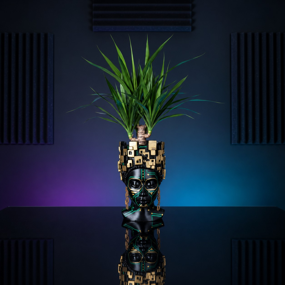 The Motherboard head planter with a dracaena in a dark gaming room
