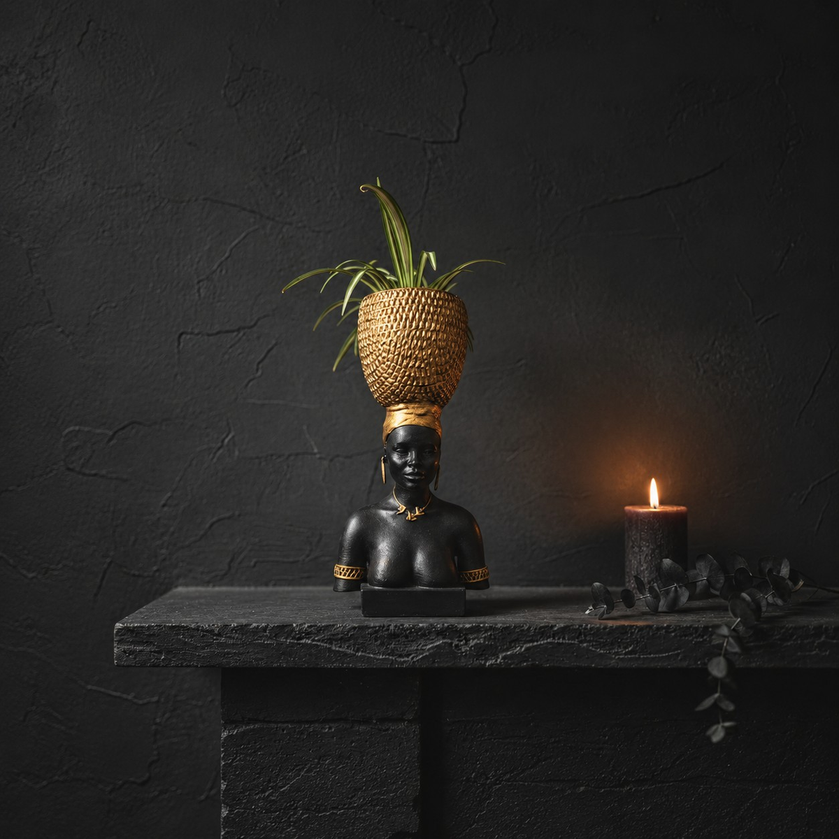 Harvest Goddess planter with a candle on a dark mantel
