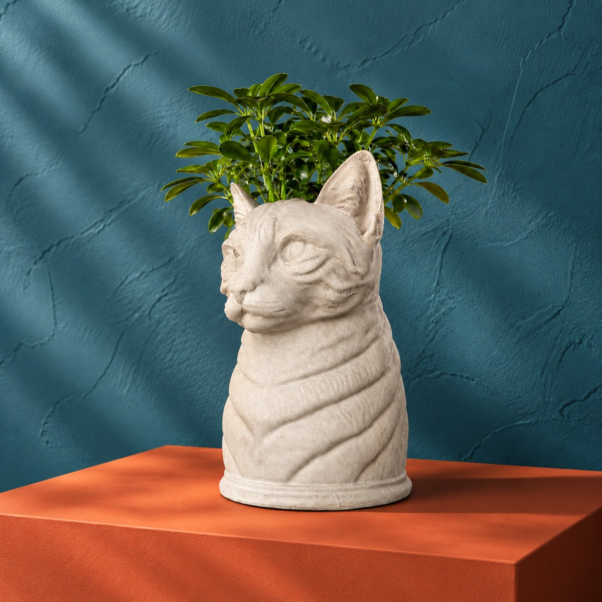 Custom cat portrait planter with bright green houseplant