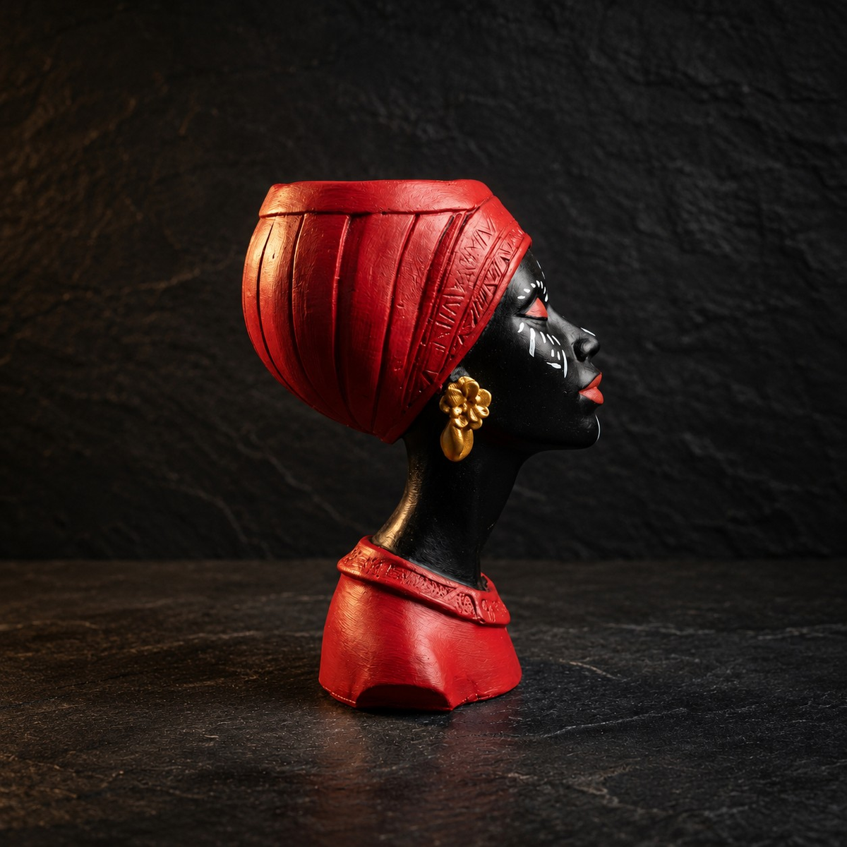 Right profile of unplanted red Afro woman head planter with gold earring